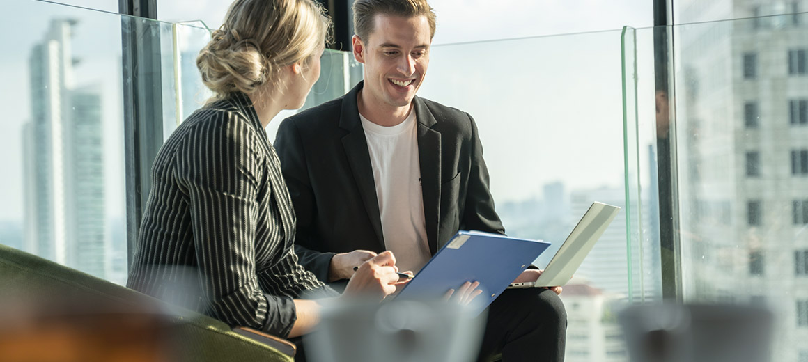young business women and man holding folderes