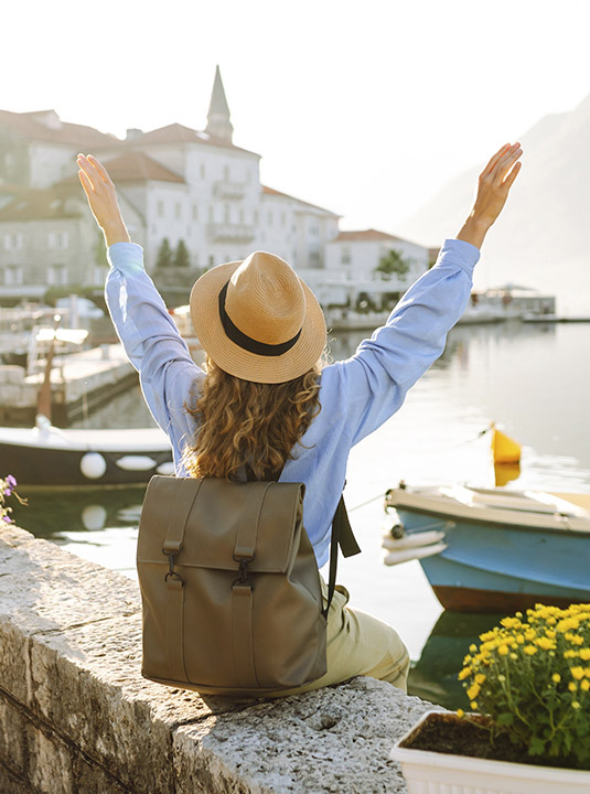 women with hands in the air