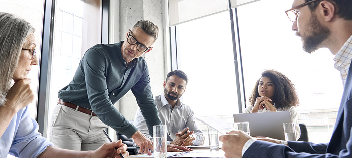 group of people at a conference room table